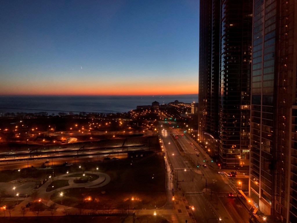Night falls on buildings in Chicago, IL
