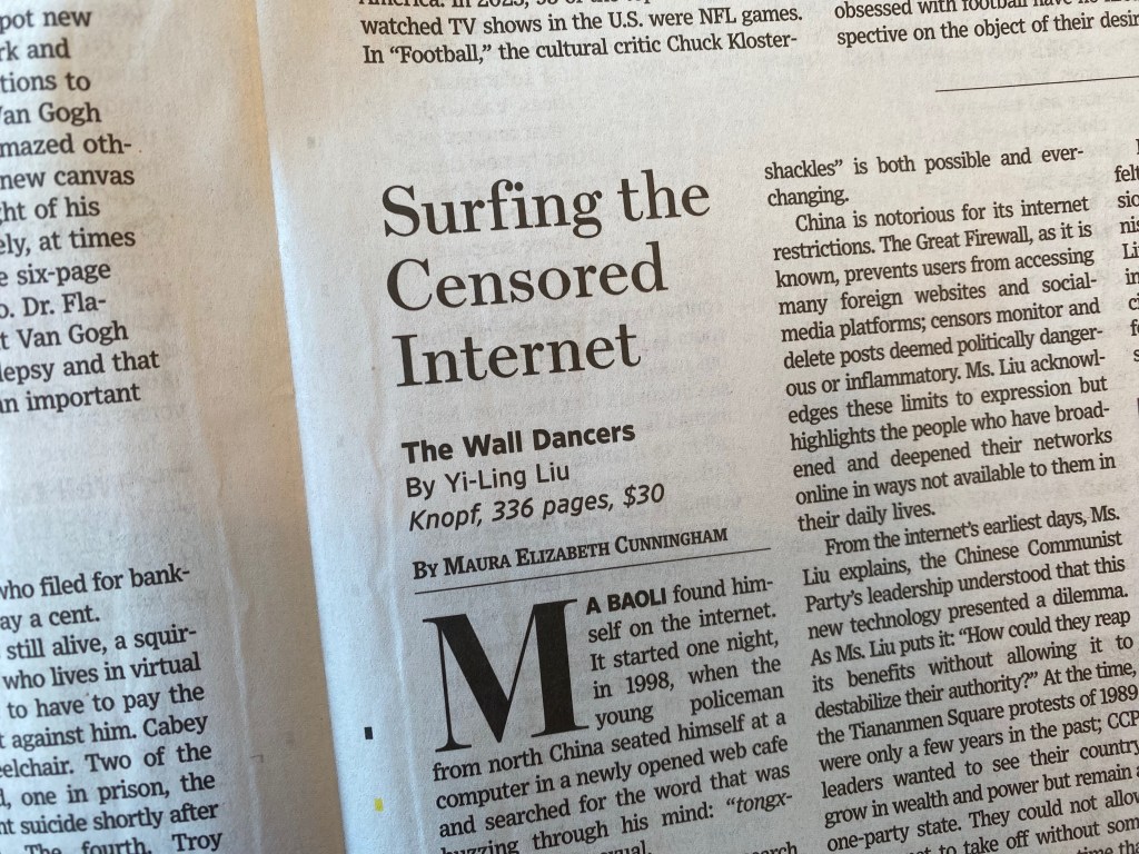 A photograph of a newspaper, showing part of a book review by Maura Elizabeth Cunningham